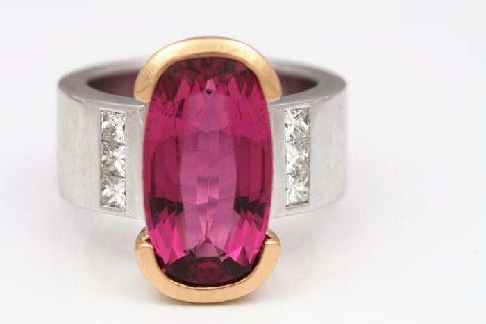 Rubellite Tourmaline and diamond ring: a Rubellite Tourmaline with diamonds in 18 karat rose gold