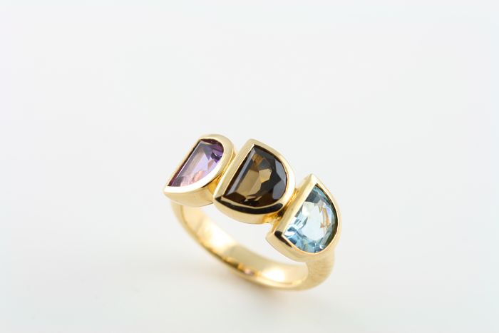 Amethyst, Smoky Quartz and Topaz ring: Amethyst, Smoky Quartz and blue Topaz set in 18 karat gold