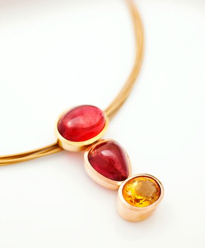 Tourmaline and Citrine triple pendant: Tourmalines and a Citrine set in 18 karat yellow and rose gold