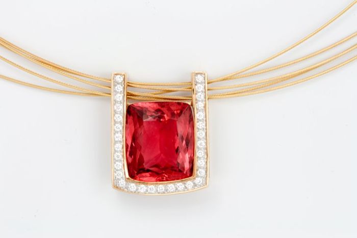 Rubellite Tourmaline square pendant: a Rubellite Tourmaline with diamonds in 18 karat yellow gold
