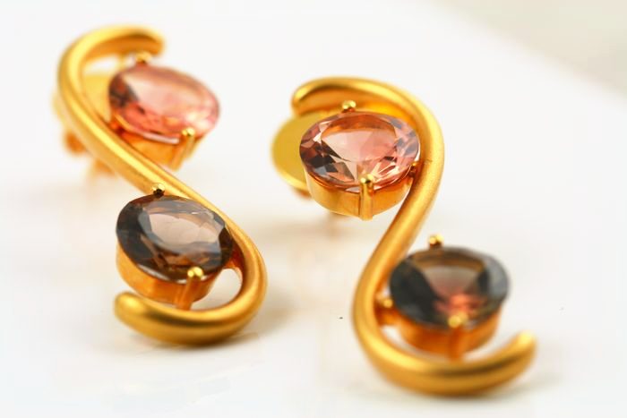 Tourmaline swirl earrings: Tourmalines set in 18 karat yellow gold