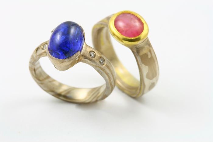 Tanzanite and Tourmaline cabochon rings: a Tanzanite and a pink Tourmaline cabochon set on Mokume Gane