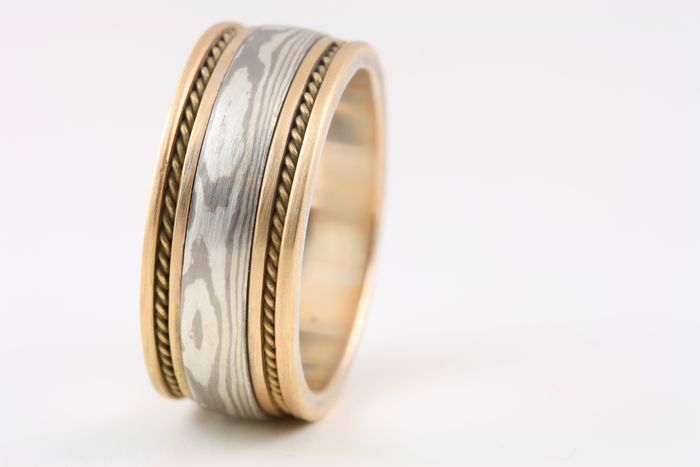 Rope-edge Mokume Gane band: a Mokume Gane band with 18 karat gold