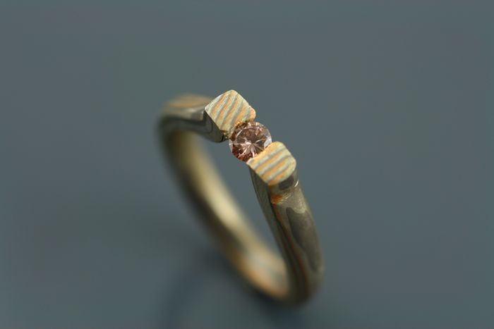 Champagne diamond Mokume Gane ring: a champagne diamond set in a Mokume Gane ring