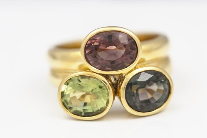 Tourmaline stacking rings: Tourmalines set in 18 karat yellow gold