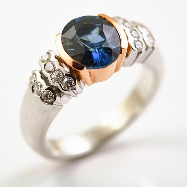 Sapphire and diamond ring: a blue Sapphire with diamonds in 18 karat rose and white gold