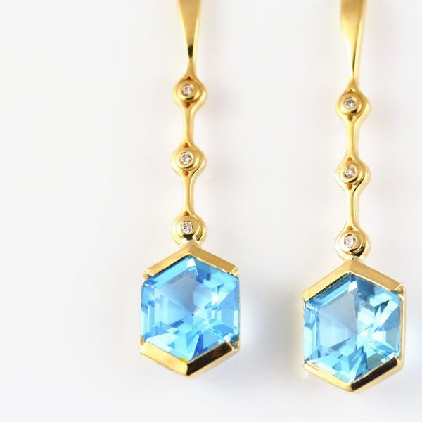 Topaz hexagon drops: blue Topaz and diamonds set in 18 karat yellow gold