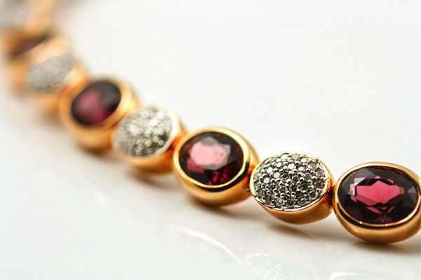 Garnet bracelet: Garnets and diamonds set in 18 karat rose gold