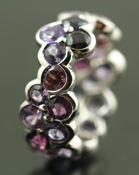 Multicoloured Spinel band: Pink, purple and blue Spinels set in 18 karat white gold