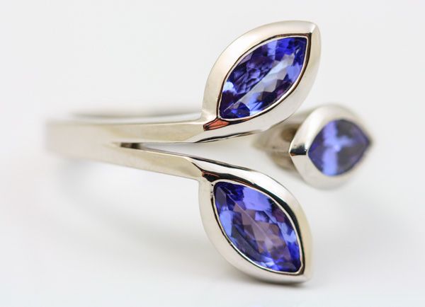 Tanzanite leaf ring: Tanzanites set in 18 karat white gold