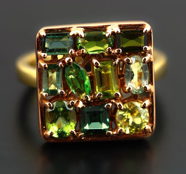Tourmaline mosaic ring: green Tourmalines set in 18 karat yellow gold